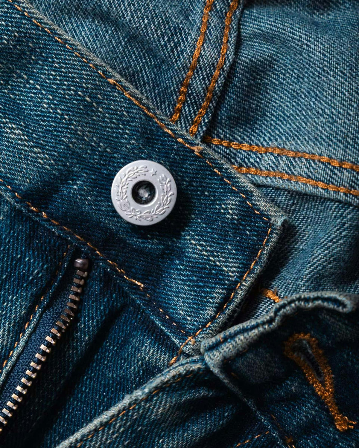 Close-up of the waistband button